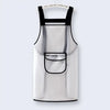 A white waterproof kitchen apron with black trim and a pocket on a hanger.