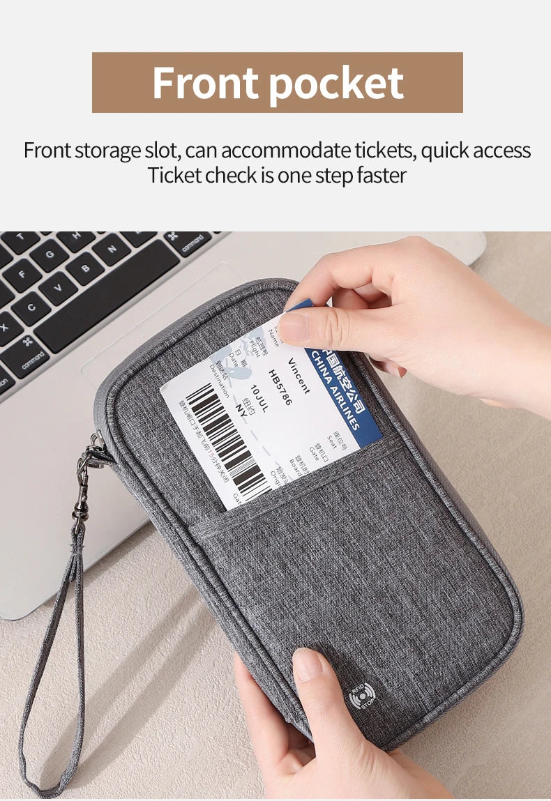 A gray front pocket storage slot on a laptop, showing how to quickly access tickets and travel documents.