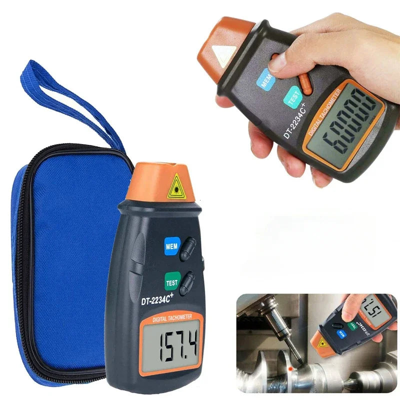 A hand holds a digital laser tachometer measuring RPM on a metal surface, with the device and blue carrying case visible.