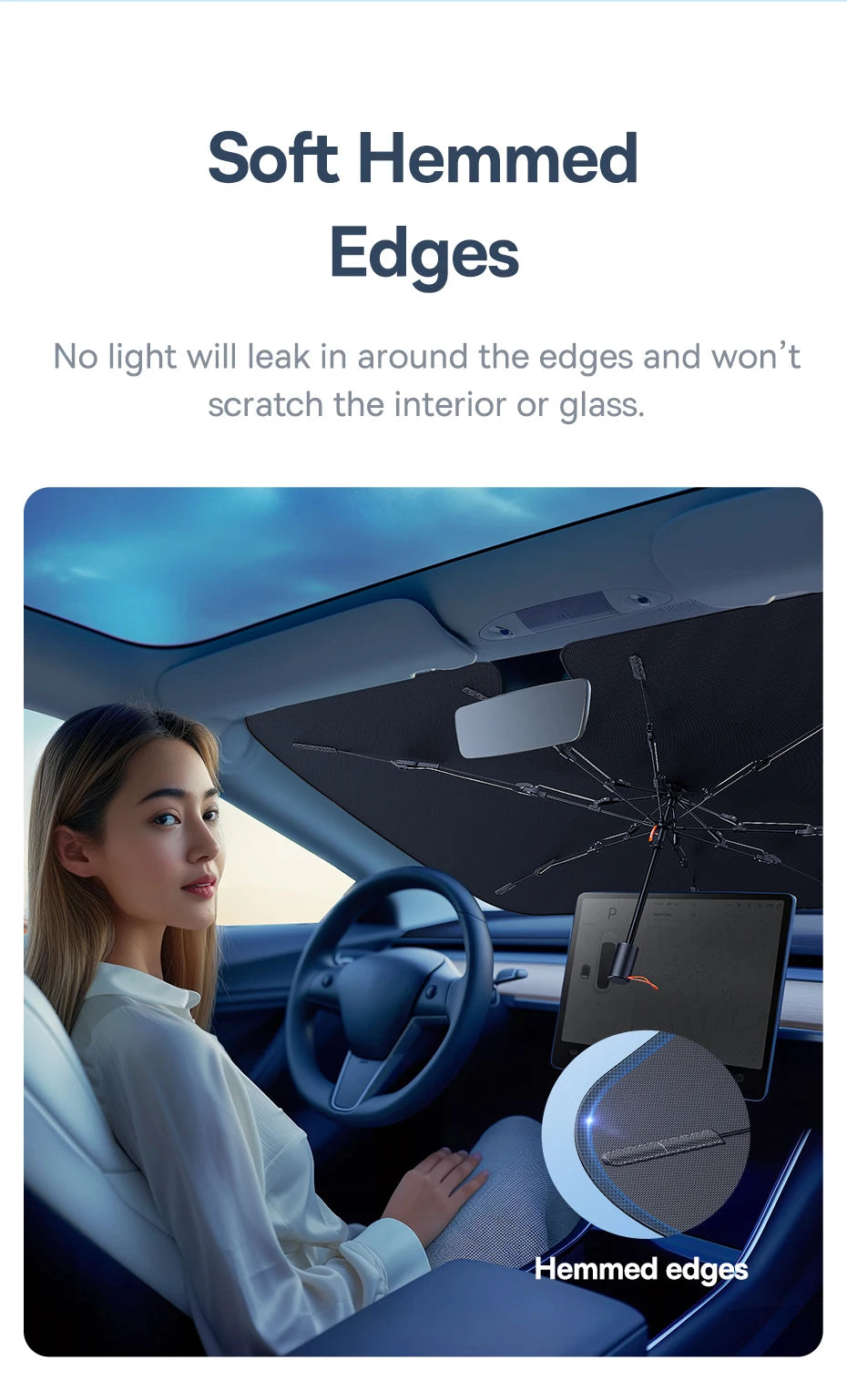 Interior view of a car showing soft hemmed edges on the windshield and interior panel.