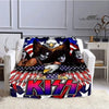 A flannel throw blanket featuring a graphic design of the KISS band logo and eagle imagery.