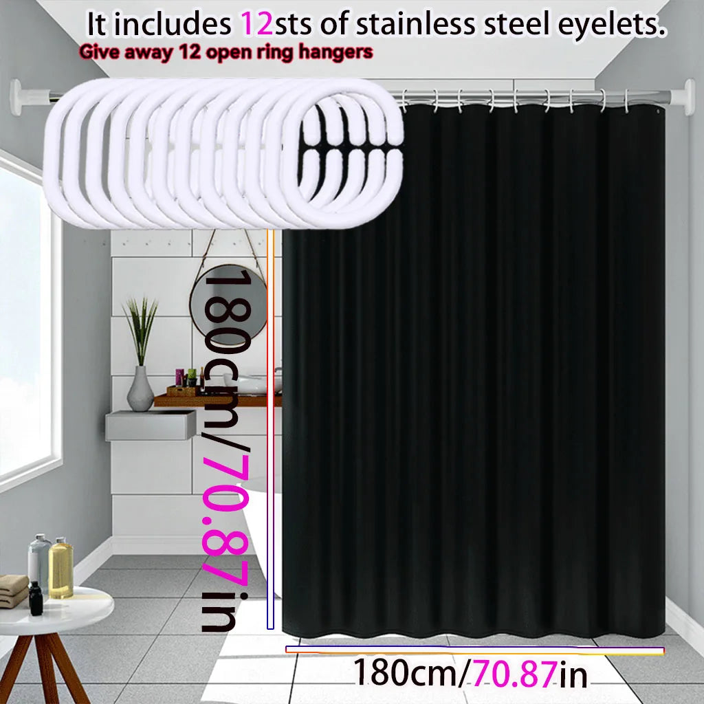 Solid black waterproof PEVA shower curtain hanging on a rod with stainless steel eyelets.