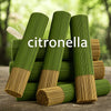 A stack of green citronella incense sticks with natural lemongrass aroma.