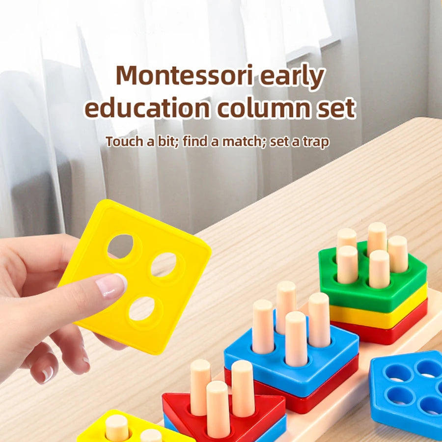 A hand holds a yellow geometric stacking block from a Montessori early education column set on a wooden surface.
