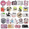A set of enamel pins featuring various book-themed designs and sayings.