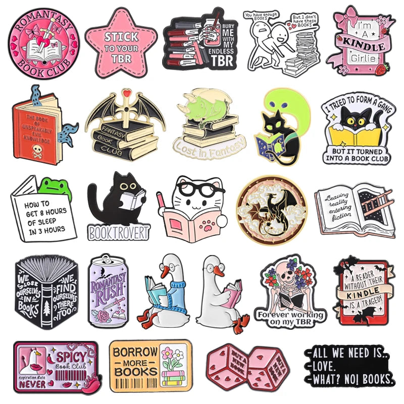 A set of enamel pins featuring various book-themed designs and sayings.