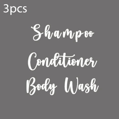 Three refillable bottles of shampoo conditioner and body wash products.