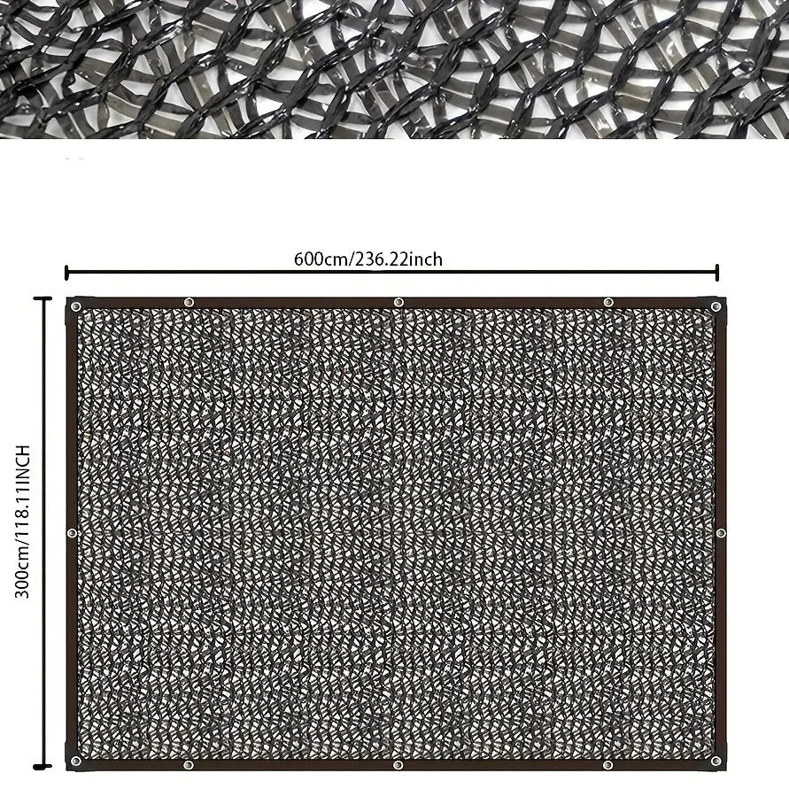 A rectangular black shade cloth with a mesh pattern and reinforced edges, measuring 600cm by 300cm.