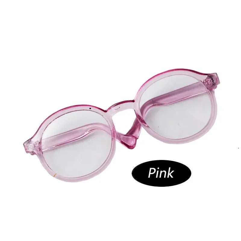 Pink transparent plastic sunglasses for dolls