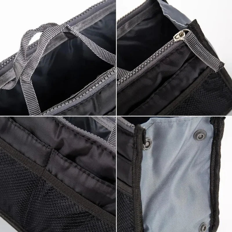 Close-up view of a black foldable oxford cloth makeup organizer bag showing the zipper and interior lining.