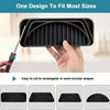 A hand holds a black silicone drip tray with raised ridges, demonstrating its design for various sizes.
