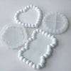 White silicone tray molds shaped like hearts and leaves for crafting resin, gypsum, and clay