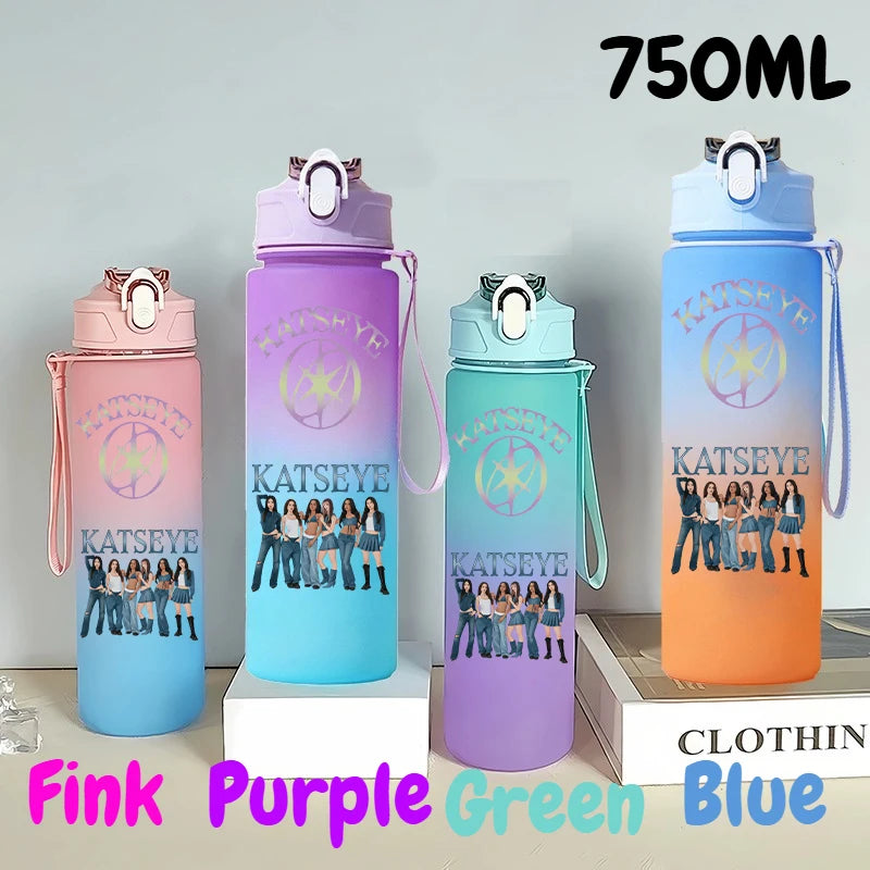 A set of 750ml portable sports water bottles in pink, purple, green, and blue colors displayed on a white surface.