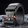 A close-up of a black tactical nylon belt with a secure metal buckle resting on a dark, textured surface.