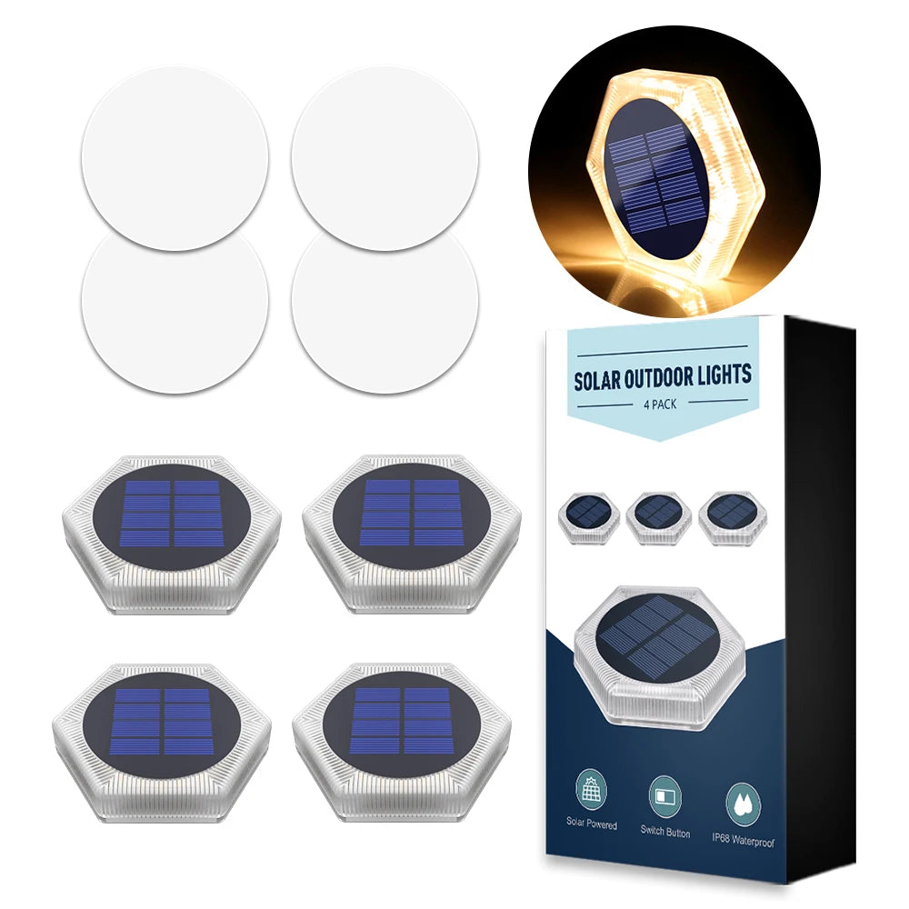 A pack of solar powered LED outdoor lights featuring hexagonal panels and a switch button.