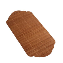 A rectangular, brown bamboo tea mat with visible woven texture and heat insulation lines.