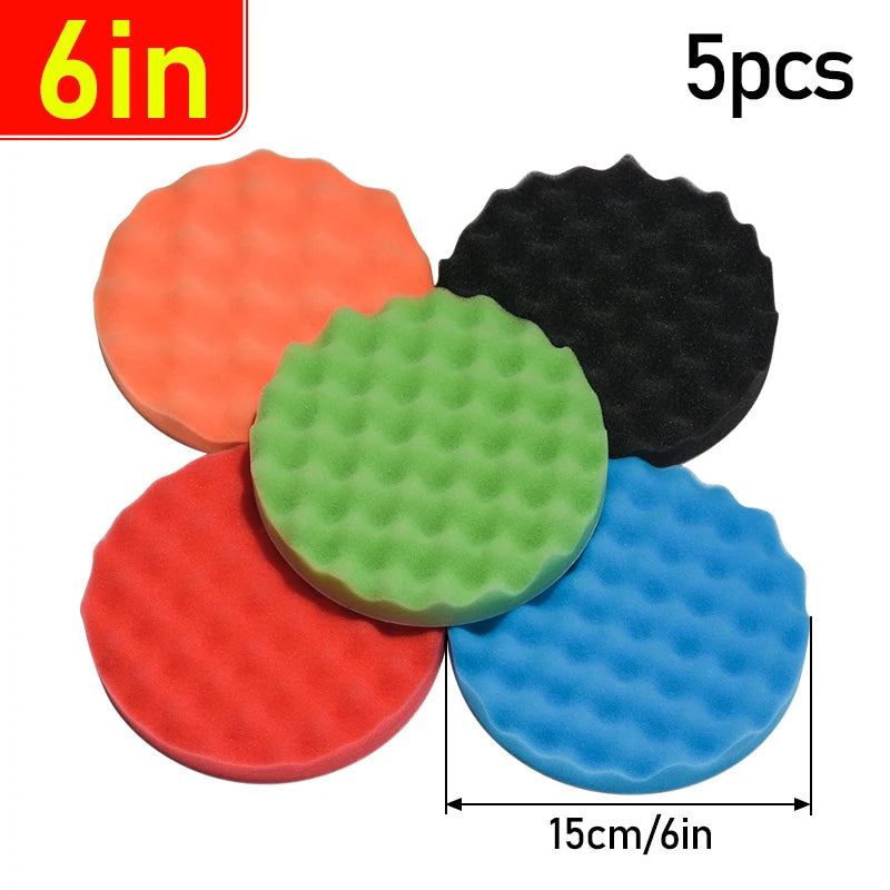 A set of five green and orange foam polishing pads for car detailing, with a measurement scale showing 15cm/6in.