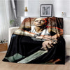 A dark throw blanket featuring a portrait of Eminem and 2Pac with tattoos and a knife motif.