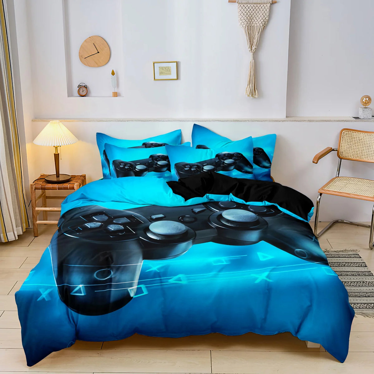 A blue duvet cover featuring a gamer theme print with controller and keyboard graphics.