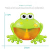 A bright green musical bubble maker bath toy shaped like a frog with large eyes and an open mouth.