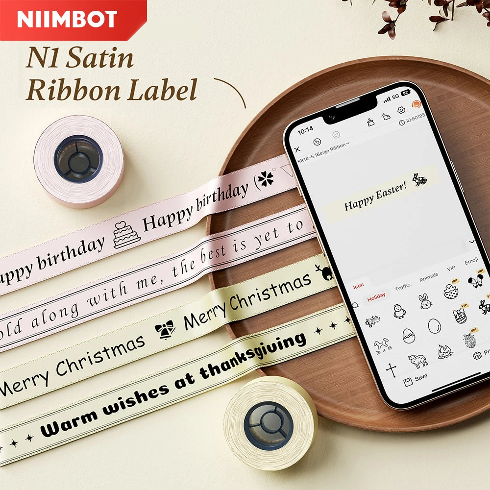Rolls of satin ribbon labels for a Niimbot N1 label printer featuring various holiday and birthday messages