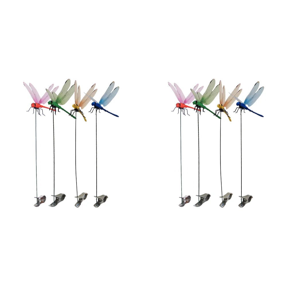 A set of lifelike dragonfly garden clips with insect repellent designs in various colors like pink, green, and blue.