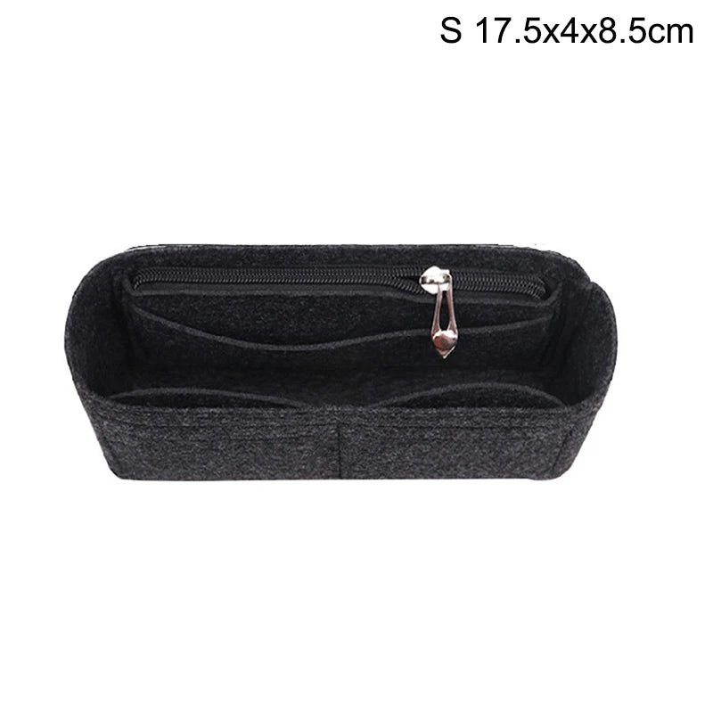 Black felt bag organizer with a zippered compartment and a hanging loop.