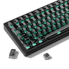 A close-up view of a black mechanical keyboard featuring crystal clear RGB backlit keycaps and MDA profile.