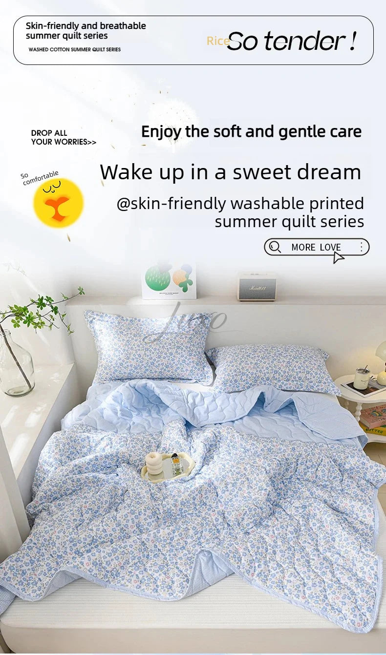 A light blue floral patterned quilt is displayed on a bed, emphasizing its soft and gentle care features.