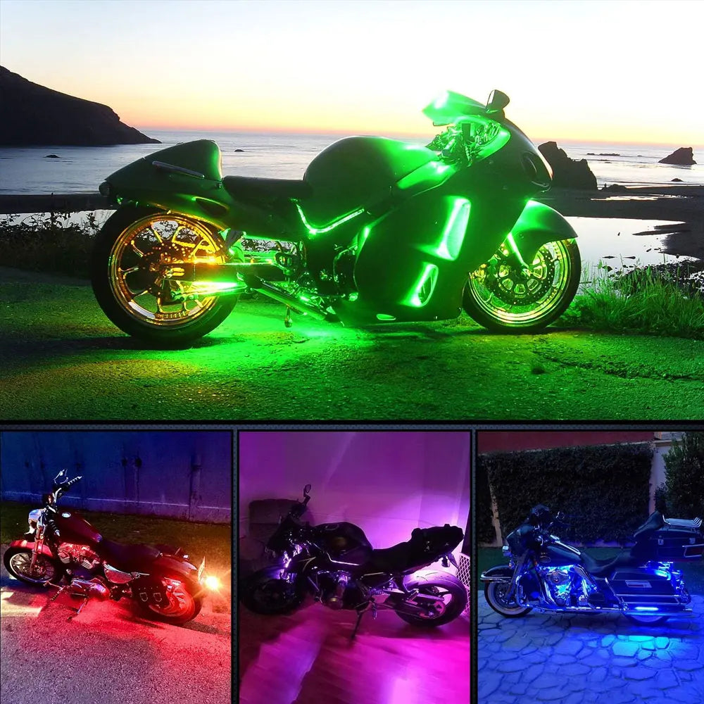 A green motorcycle is illuminated by bright green LED strip lights on a grassy field at sunset.