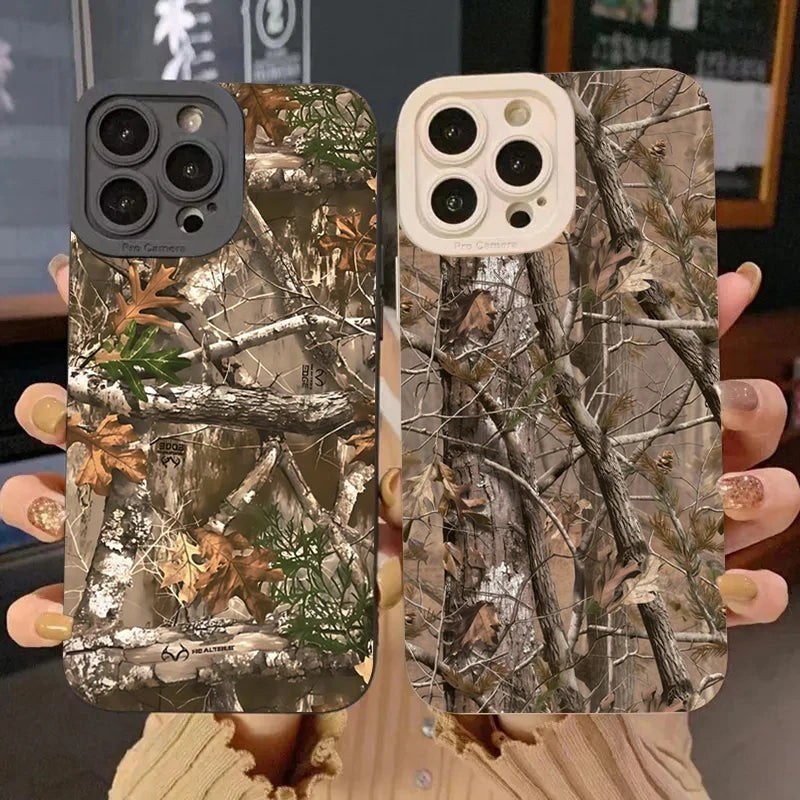 A pair of forest camouflage silicone phone cases for iPhone 12 Pro Max, showing both the back and front designs.