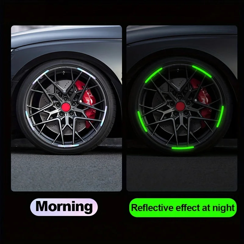 Close-up of a black alloy wheel with red brake calipers featuring bright green reflective stickers for nighttime visibility.