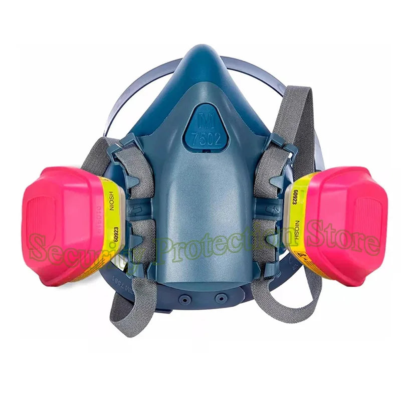 A blue full-face respirator mask with pink filters and gray straps.