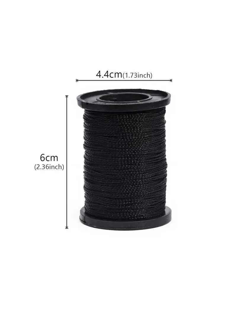 Black leather sewing awl set with replaceable needles, packaged on a spool.