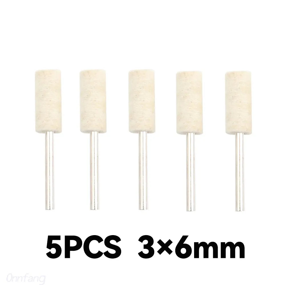 Five pieces of light beige wool felt polishing wheels with 6mm metal shafts.