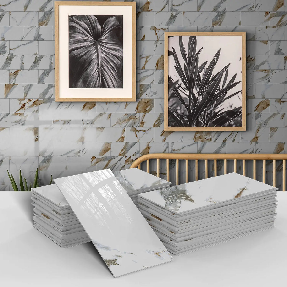 Stacks of white marble self-adhesive wall stickers displayed against a gray tiled wall.