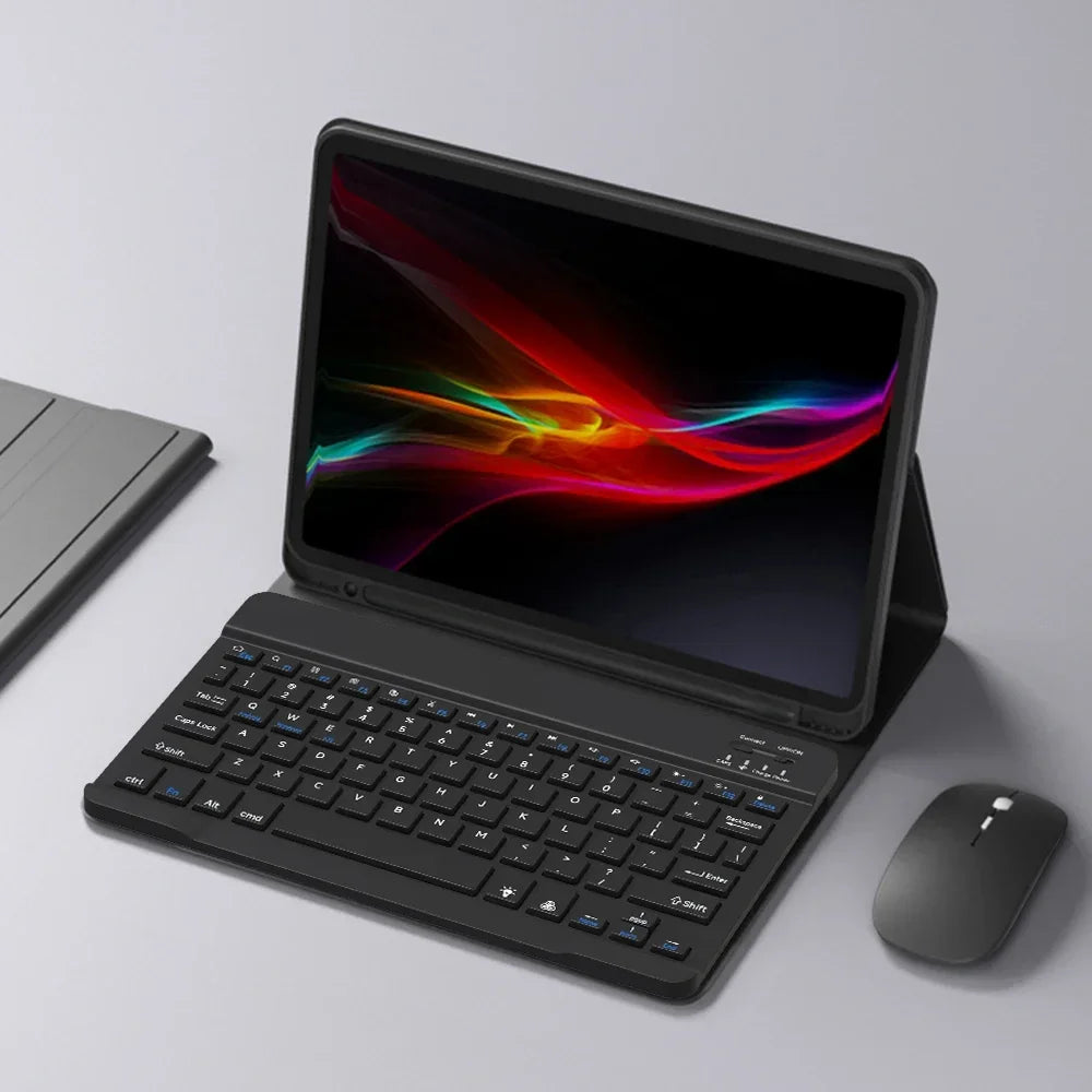 Schwarzes iPad geöffnet, zeigt einen farbigen Verlauf, mit Bluetooth-Tastatur und Maus daneben.