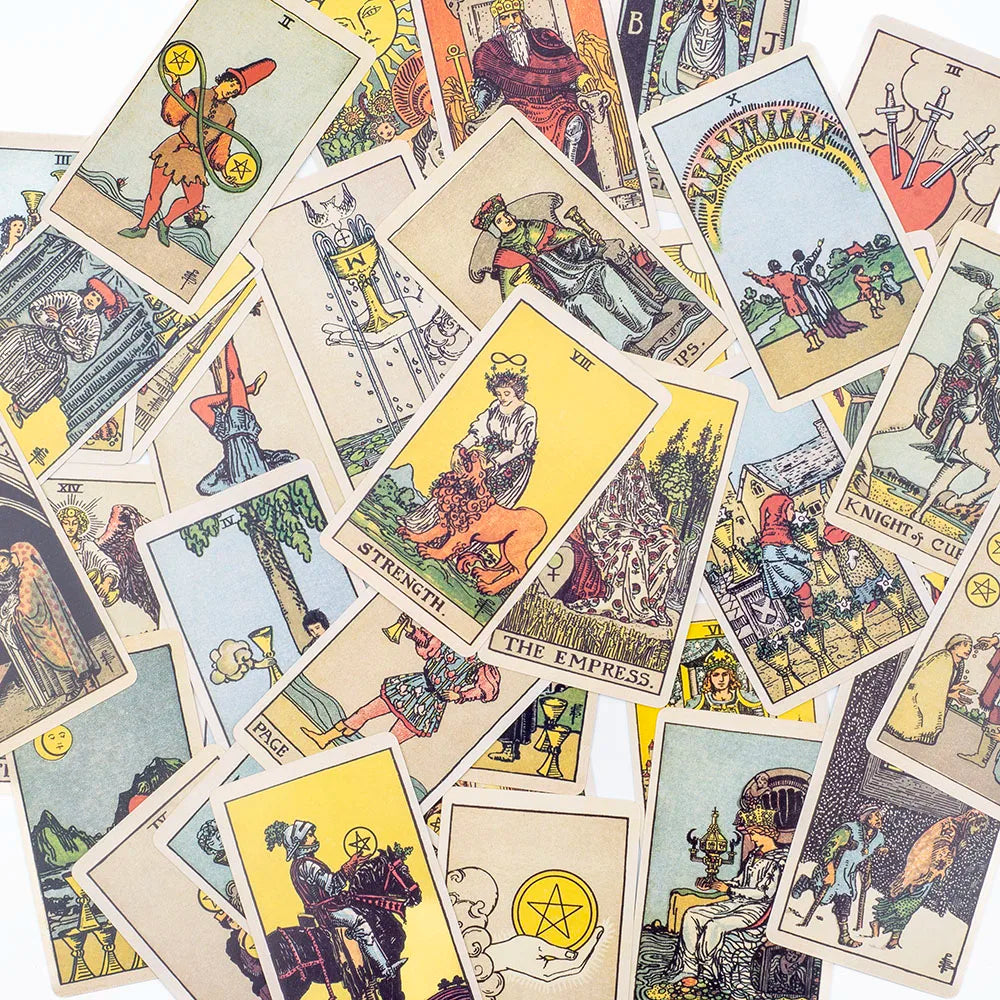 A collection of classic tarot cards featuring various figures and symbols.