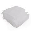 A stack of white disposable sink drain filters.