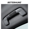 A close-up of a gray Audi Alcantara grab handle protector cover with a card pocket.