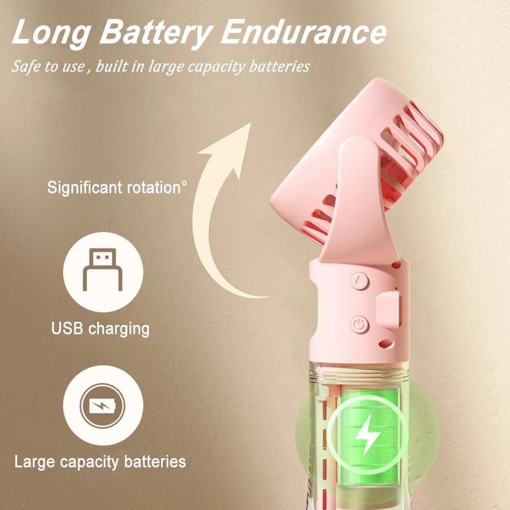 Pink portable water mist fan with a neck strap and visible USB charging port