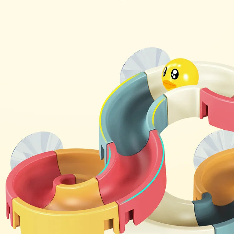 A colorful bath time duck slide toy set for toddlers showing various parts of the plastic toy.