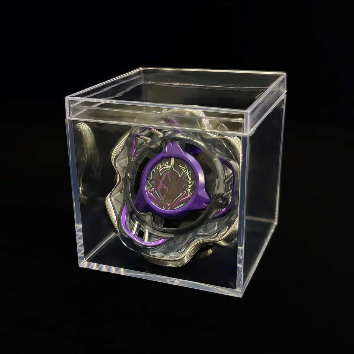 A Valkyrie Volt S4-70V metal spinning top with launcher displayed inside a clear plastic box.