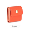 Orange compact PU leather jewelry organizer pouch with a gold-toned snap closure.