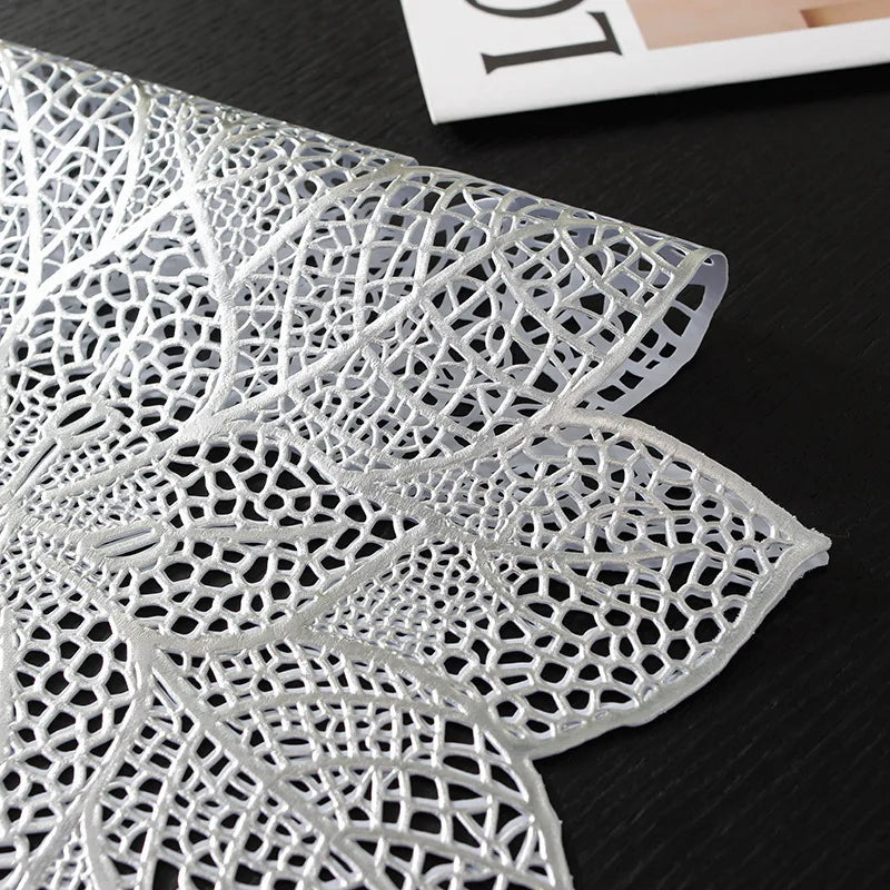 Clear white PVC table runner and placemat set with an ornate floral lace design
