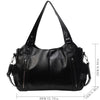 Black vintage leather tote bag with multiple pockets shown from the front.
