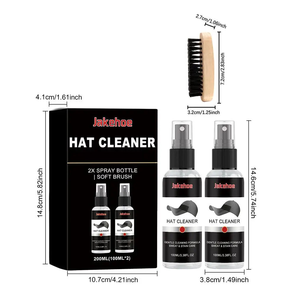 A black box containing a hat cleaner kit with a soft brush and two spray bottles for cleaning hats.