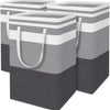 A stack of gray and white collapsible laundry hampers with handles.