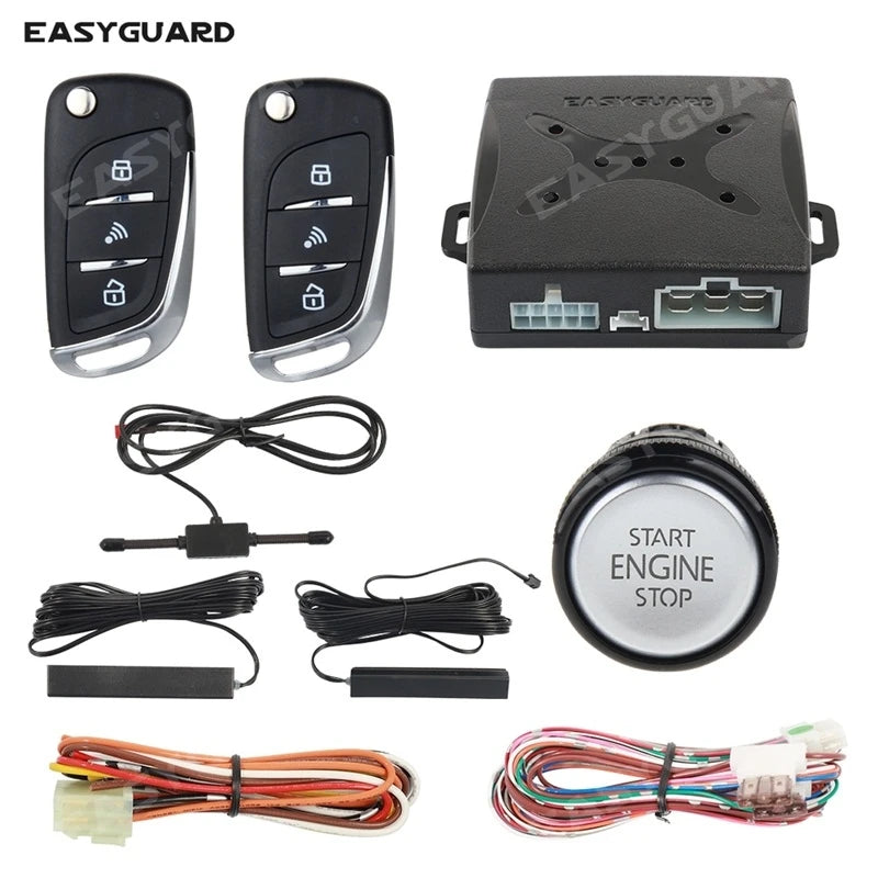 A set of keyless entry components including a remote, an ignition module, and various wiring harnesses for a PKE system.