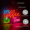 A neon sign shaped like a steaming cup of coffee with the text It's Coffee Time, powered by USB.
